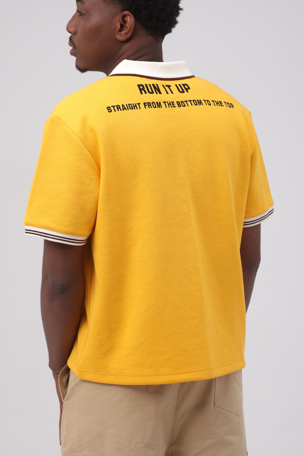 Survivor’s Guilt Yellow Polo - Image 2