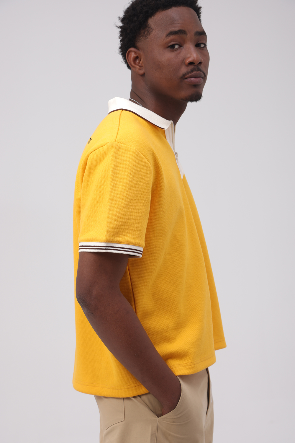 Survivor’s Guilt Yellow Polo - Image 3